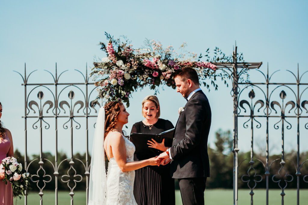 Catherine, wedding officiant in Ottawa, conducting a wedding ceremony between a bride and groom
